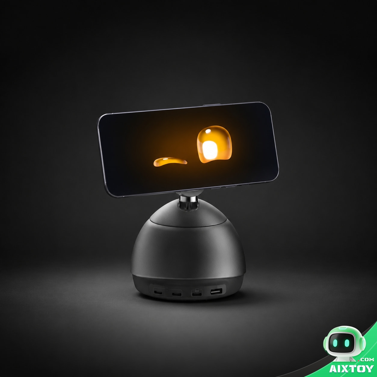 Loona DeskMate AI Desk Robot - Obsidian Black Main Image Loona DeskMate AI desk robot in obsidian black, its smartphone mounted on the magnetic head showing a glowing amber face, photographed on a dark charcoal studio background