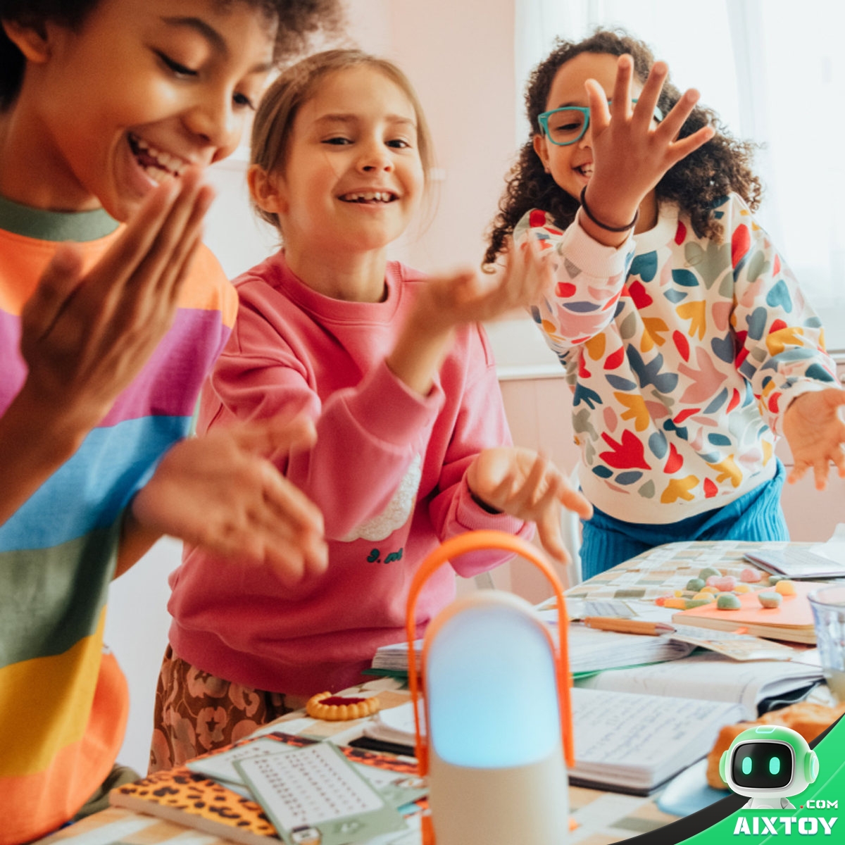 Three children playing a Mallow voice-driven audio game together at a table with the speaker in front of them