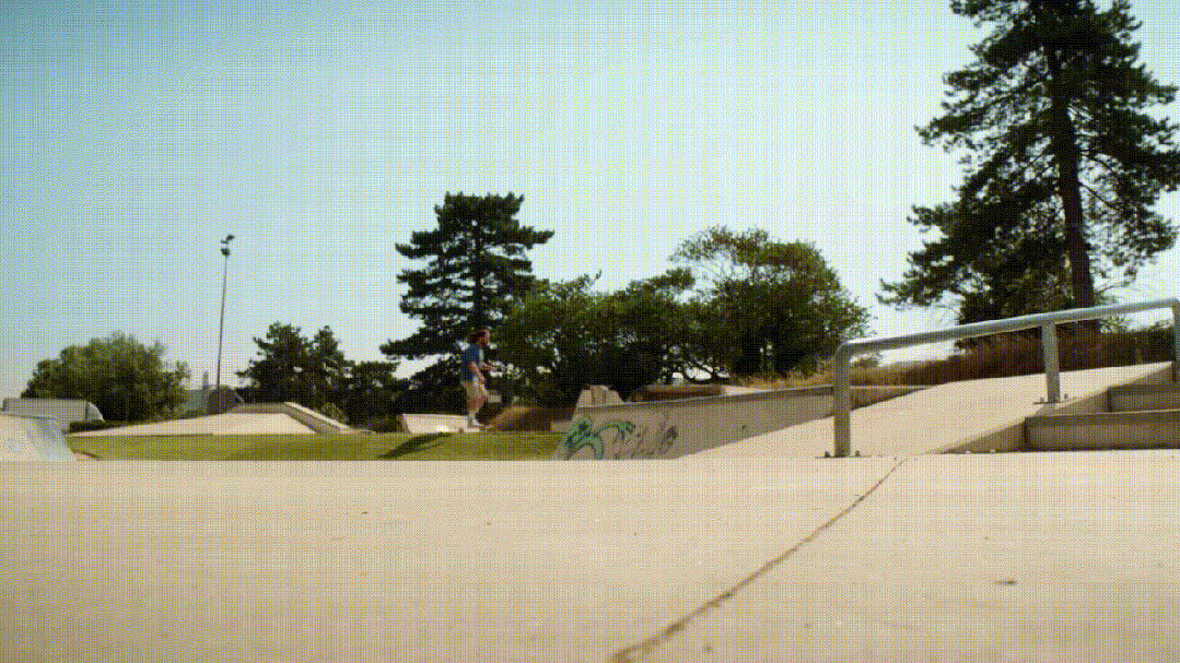 Animated Microduck robot roller-skating at a skate park