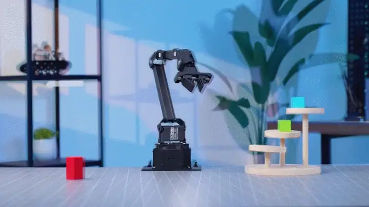 Animation of the Hiwonder NexArm picking up coloured blocks and sorting them onto a wooden stand