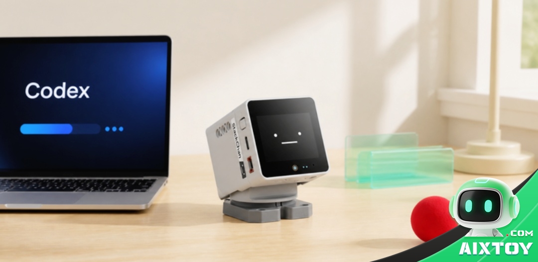 StackChan ESP32-S3 desktop robot on a desk next to a laptop running an AI coding assistant