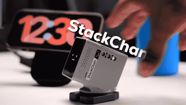 StackChan ESP32-S3 robot showing animated screen expressions and RGB eye lighting
