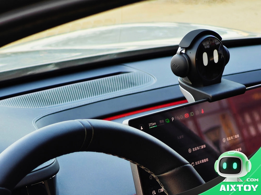 TOOOONY AI ball mounted on a car dashboard above the infotainment screen with a steering wheel in the foreground